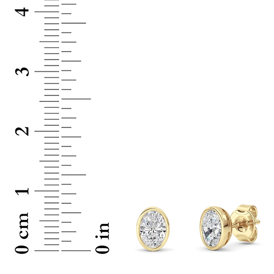 1Cttw Oval Shaped Lab Grown Diamond (F/VS) Bezel Set Stud Earrings in 14K Gold
