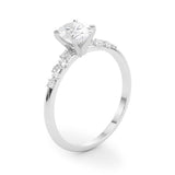Scattered Diamond Oval Engagement Ring