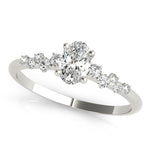 Scattered Diamond Oval Engagement Ring