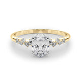 Scattered Diamond Oval Engagement Ring