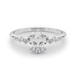 Scattered Diamond Oval Engagement Ring