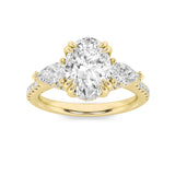 3CTW Oval Shaped Lab Grown Diamond (F/VS) Three Stone Accented Engagement Ring in 14K Gold