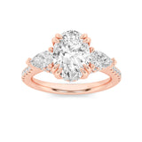 3CTW Oval Shaped Lab Grown Diamond (F/VS) Three Stone Accented Engagement Ring in 14K Gold