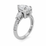 3.5CTW Pear Shaped Lab Grown Diamond (G/VS) Three Stone Accented Engagement Ring in 14K Gold