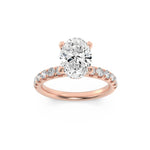 2CTW Oval Shaped Lab Grown Diamond (F/VS) Hidden Halo Accented Ring in 14K Gold