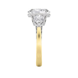 4CTW Oval Shaped Lab Grown Diamond (F/VS) Accented Three Stone Ring in 14K Gold
