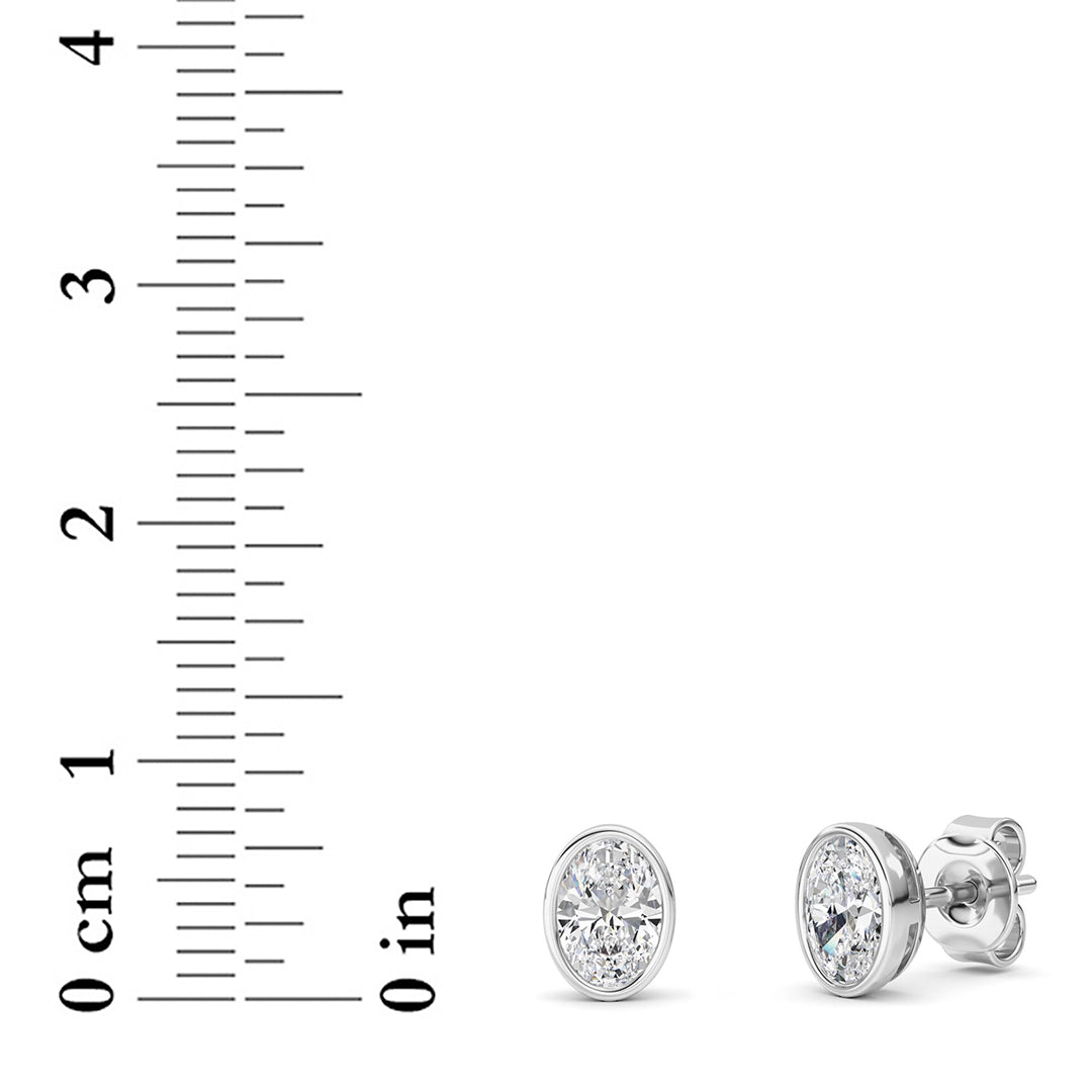 1CTW Oval Shaped Lab Grown Diamond (F/VS) Bezel Set Stud Earrings in 14K Gold