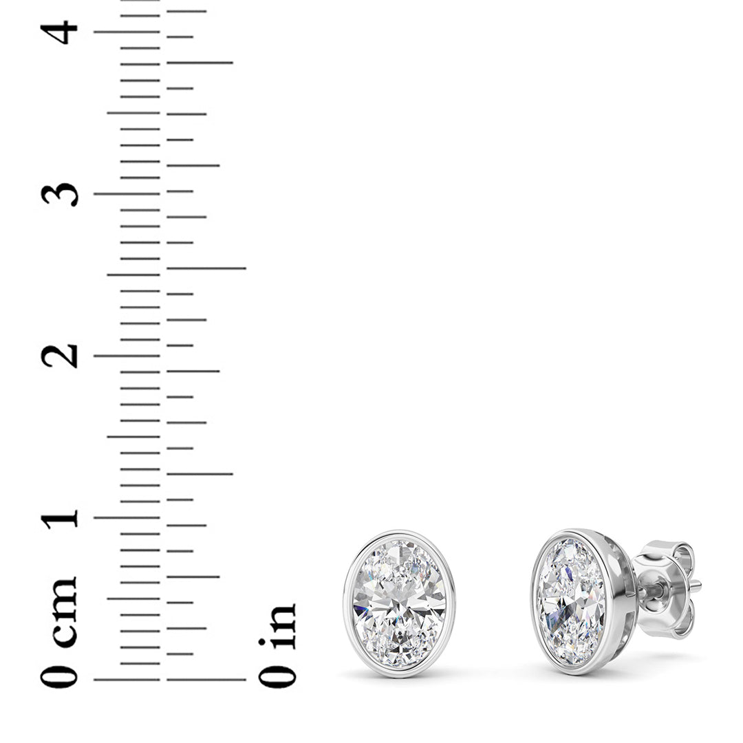 2CTW Oval Shaped Lab Grown Diamond (F/VS) Bezel Set Stud Earrings in 14K Gold