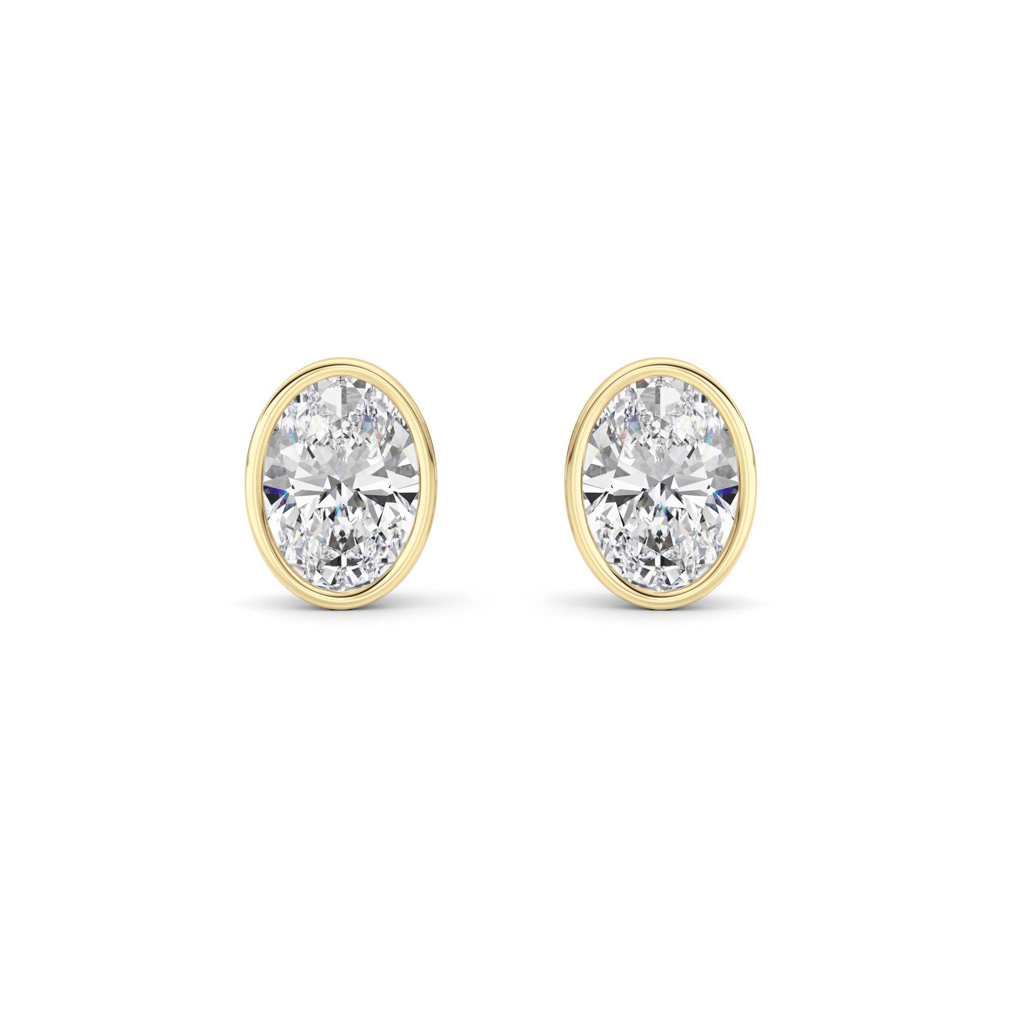 2CTW Oval Shaped Lab Grown Diamond (F/VS) Bezel Set Stud Earrings in 14K Gold