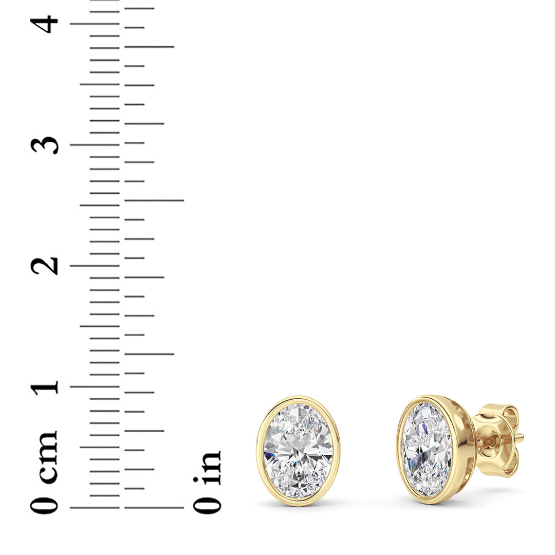 2CTW Oval Shaped Lab Grown Diamond (F/VS) Bezel Set Stud Earrings in 14K Gold